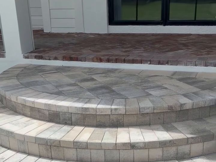 Curved paver steps built by Legacy Paving & Landscaping